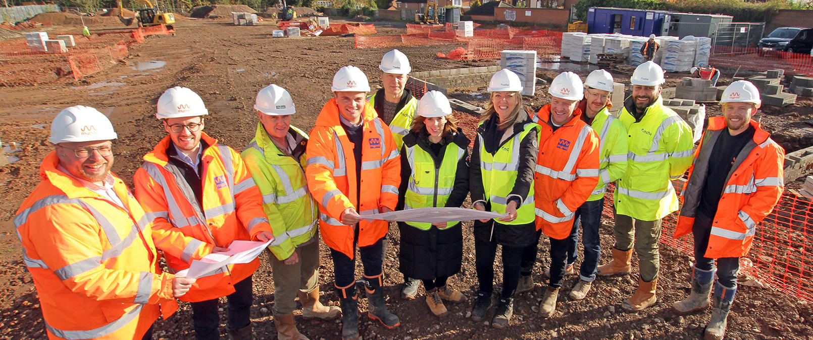 Colleagues Looking At Site Plans