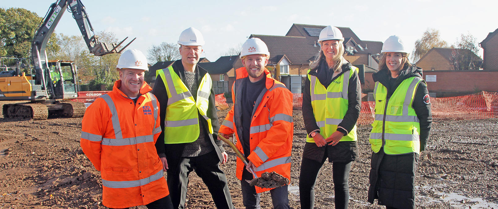 Colleagues Standing Together On Beechdale Road Site